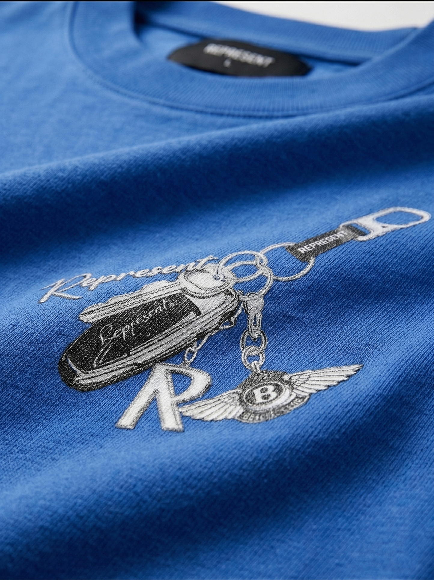 Represent Owners’ Club "Keyline" Tee